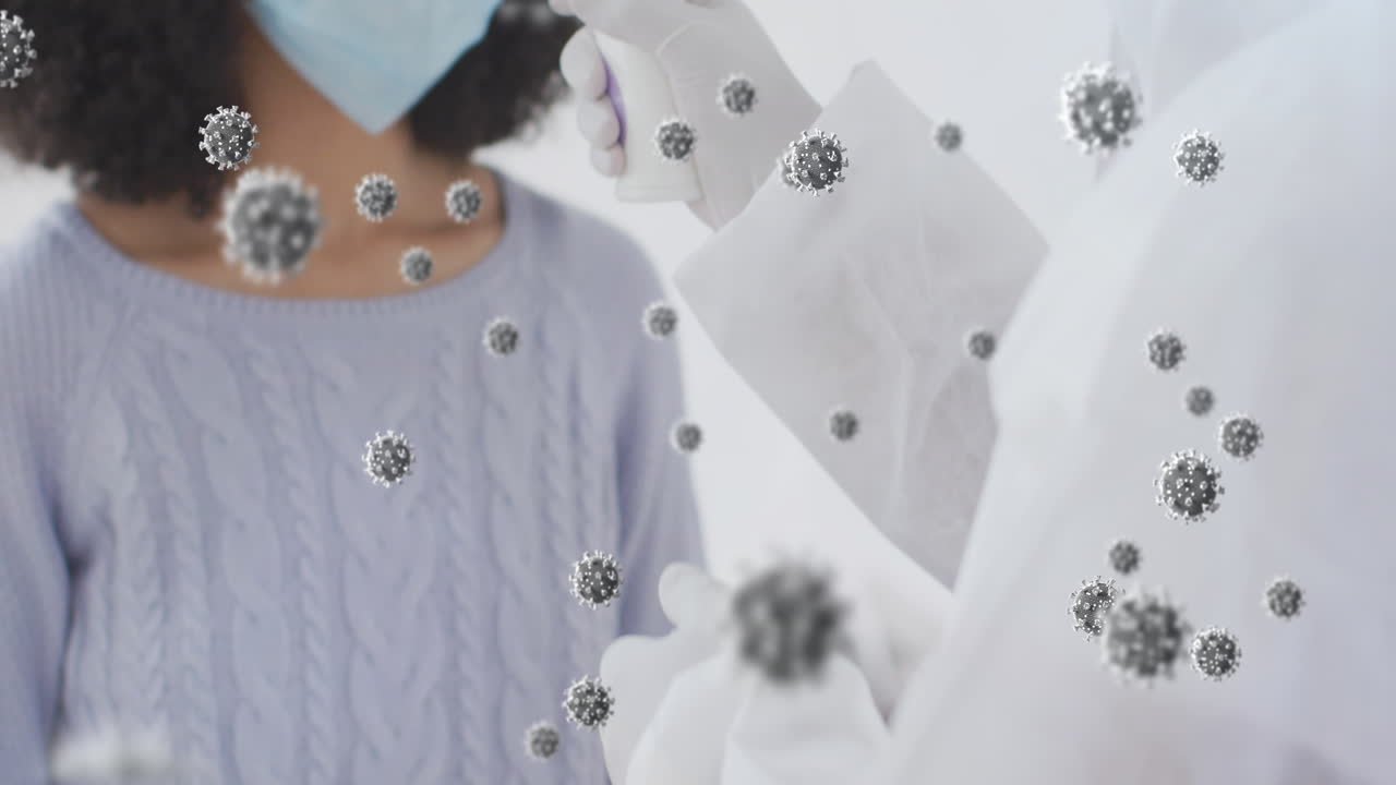 아프리카계 미국인 여성의 온도를 측정하는 바이러스 세포의 애니메이션