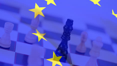 eu flag waving against chess board
