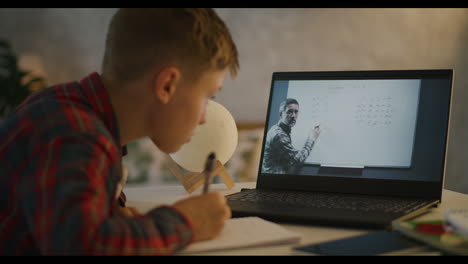 boy doing online math class