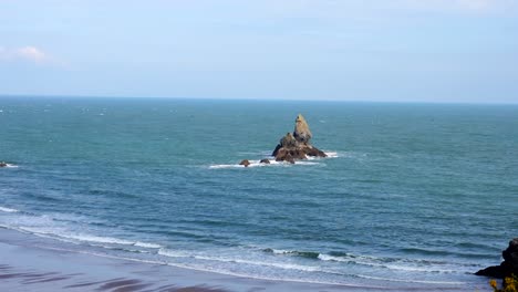 Handheld-static-shot-of-Church-Rock-off-Broad-Haven-South-Beach-in-Pembrokeshire-Coast-National-Park