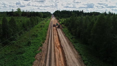 Aerial-view-tractors-and-machinery-destroying-forest