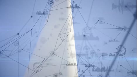 Animation-Eines-Netzwerks-Von-Verbindungen-Und-Datenverarbeitung-über-Einem-Männlichen-Architekten,-Der-Auf-Einer-Windmühle-Steht