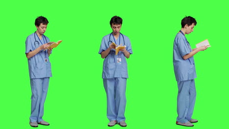 Medical-assistant-reading-a-literature-book-against-greenscreen-backdrop