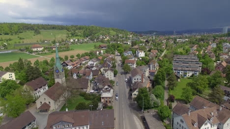 drone shot flying over a suburban area in winterthur, switzerland