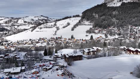 Pan-to-ski-station-in-winter-with-snow,-and-moutain,-Bernex,-French-Alps