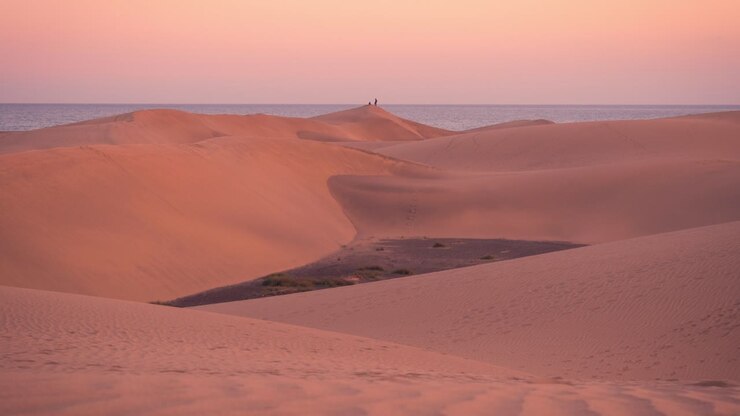 Tramonto in timelapse nella località desertica delle dune di Maspalomas a Gran Canaria, Isole Canarie, Spagna
