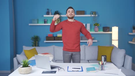 Young-businessman-showing-how-to-exercise-in-the-office.-They-relax-by-doing-standing-neck-exercises.