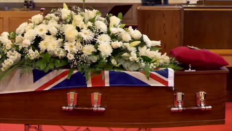 closeup-shot-of-a-funeral-casket-in-a-hearse-or-chapel-or-burial-at-cemetery