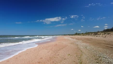 Endless-empty-beach-of-the-Sea-of-Azov-against-the-blue-sky-4k