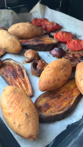assortment of roasted vegetables on a baking sheet