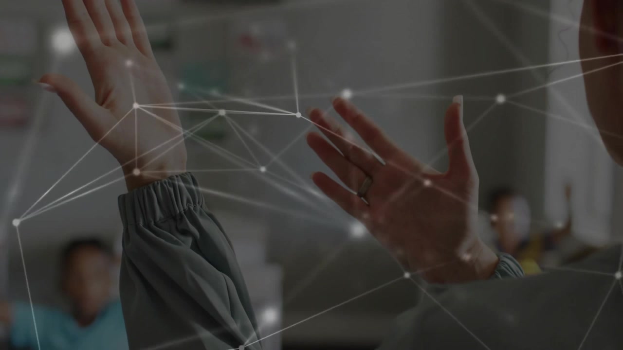 Teacher raising hands activating network animation while students matching gesture in education
