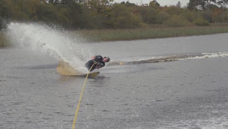 young athletic man slalom ski recovery