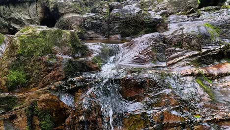 small waterfall cascading over rocks