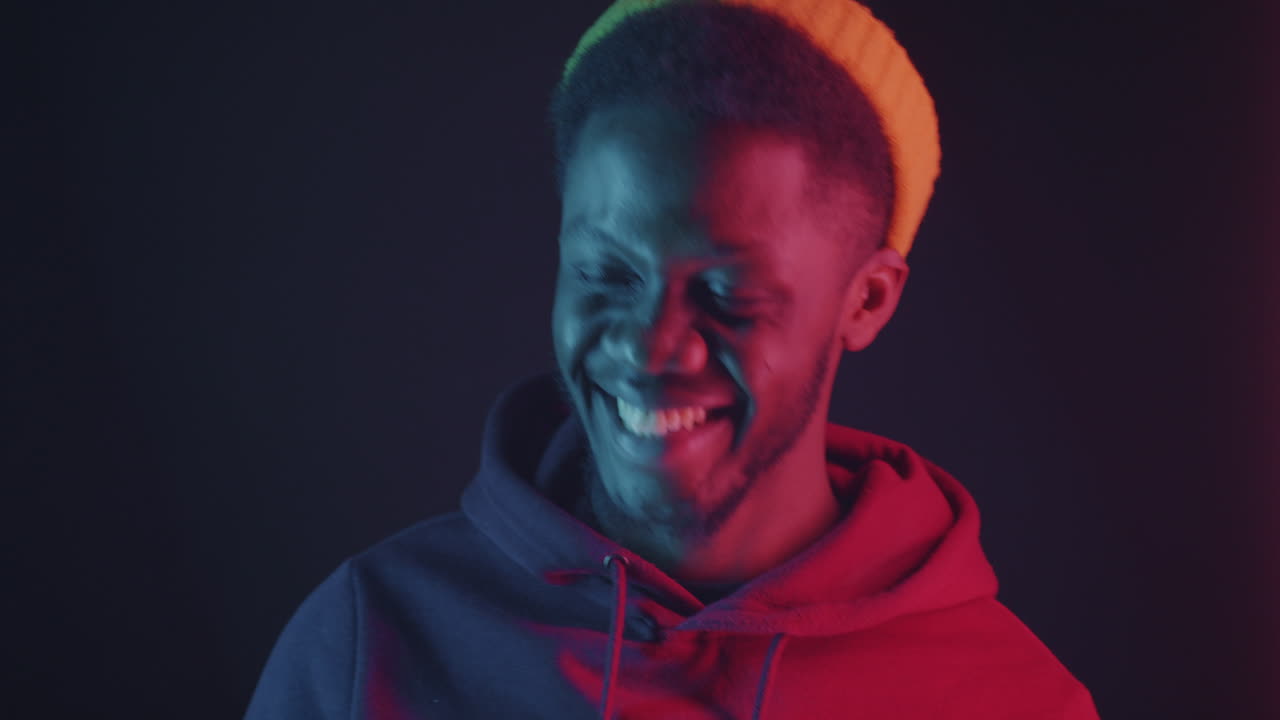 Smiling Man in Neon Light