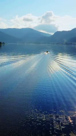 serene mountain lake with boat