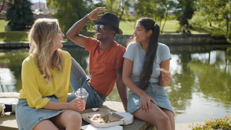 young people having a good time near the river