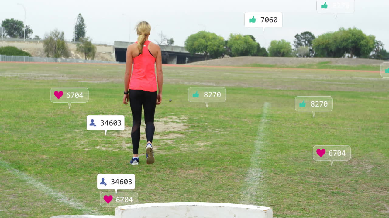 Animation of social media notifications over caucasian woman at sports field