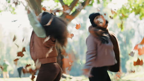 Friends,-women-and-dancing-in-autumn-leaves