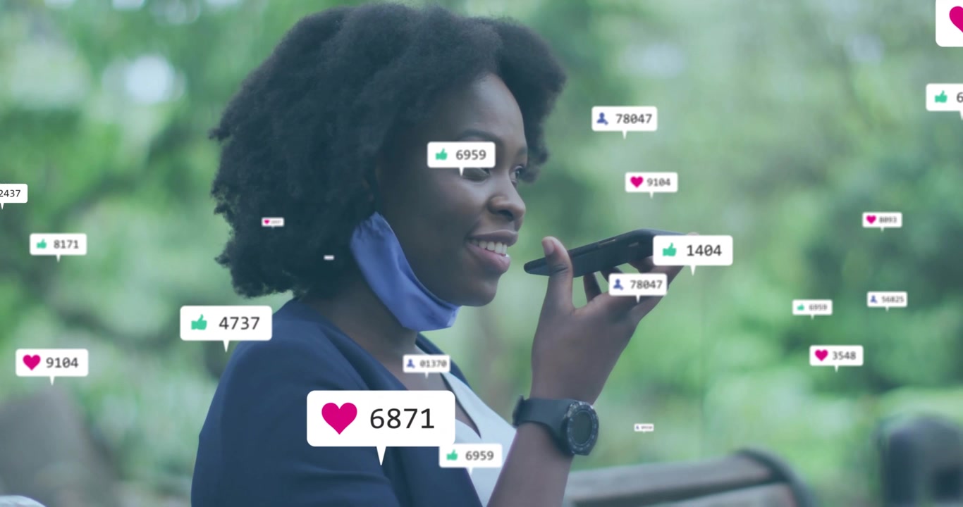Masked woman in blazer lifting smartphone to mouth on park bench, generating social media metrics