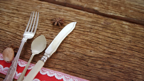 various cutlery on wooden table 4k