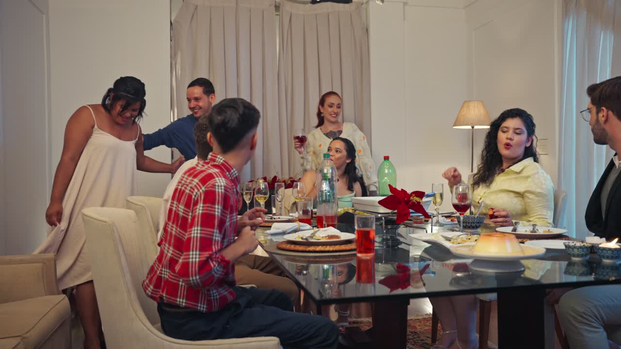 People Gathering for a Festive Meal at Home