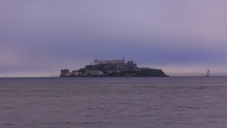 alcatraz island with fog passing by