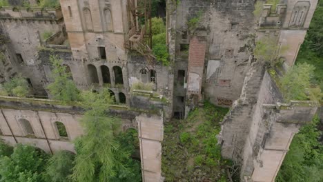 tilting aerial shot of the abandoned lennox castle