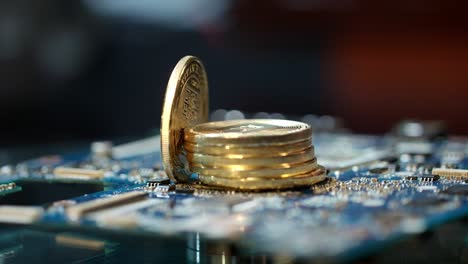 Bitcoin-mining-on-gpu-farm-equipment.-Close-up-of-stack-of-gold-bitcoins