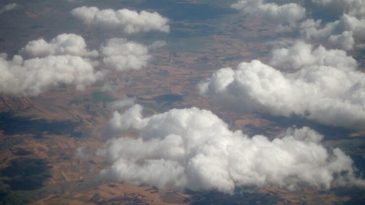 Aerial View of Clouds and Landscape