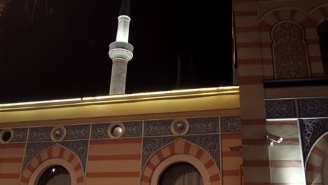 minaret of emperor's mosque (gazi husrev) at night in sarajevo, bosnia and herzegovina