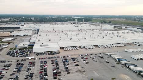 massive car assembly factory in toledo, ohio, aerial drone ascend view