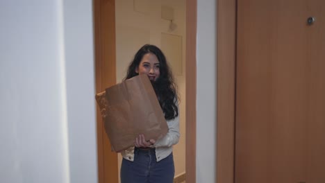 friends meeting at the apartment door
