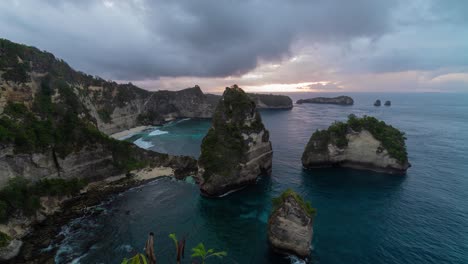 dramatic coastal sunrise over nusa penida, indonesia