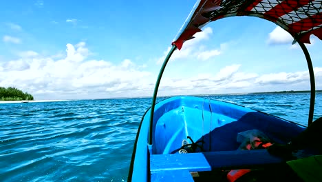 Static-view-from-a-rural-boat-navigating-in-tropical-waters-of-Mnemba-Island-in-Zanzibar,-Tanzania