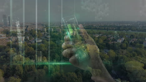 holding smartphone with digital animation over cityscape and green park view