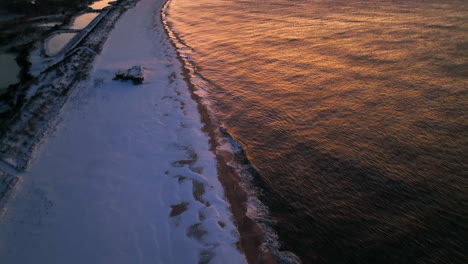 Sand-beach-covered-in-white-snow