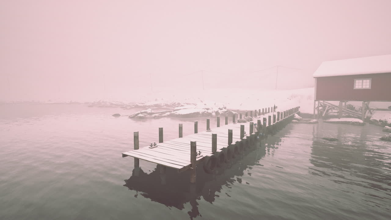 Snowy Pier with Red Cabin in the Fog