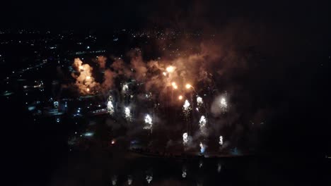 group of exploding firework at night sky of dominican republic