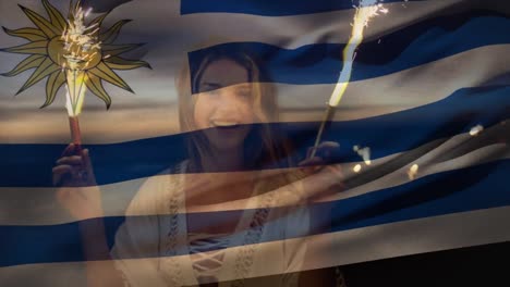 Animation-of-waving-of-uruguay-flag-over-group-of-friends-on-the-beach