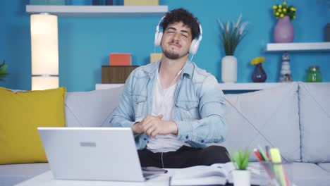 The-student-who-finishes-the-lesson-is-happy-and-listens-to-music-and-dances.