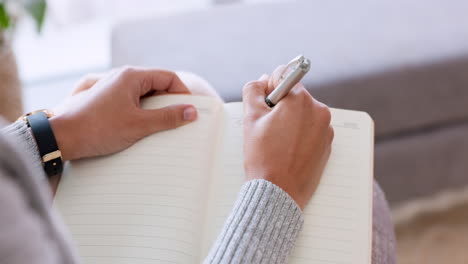 woman hands writing in notebook