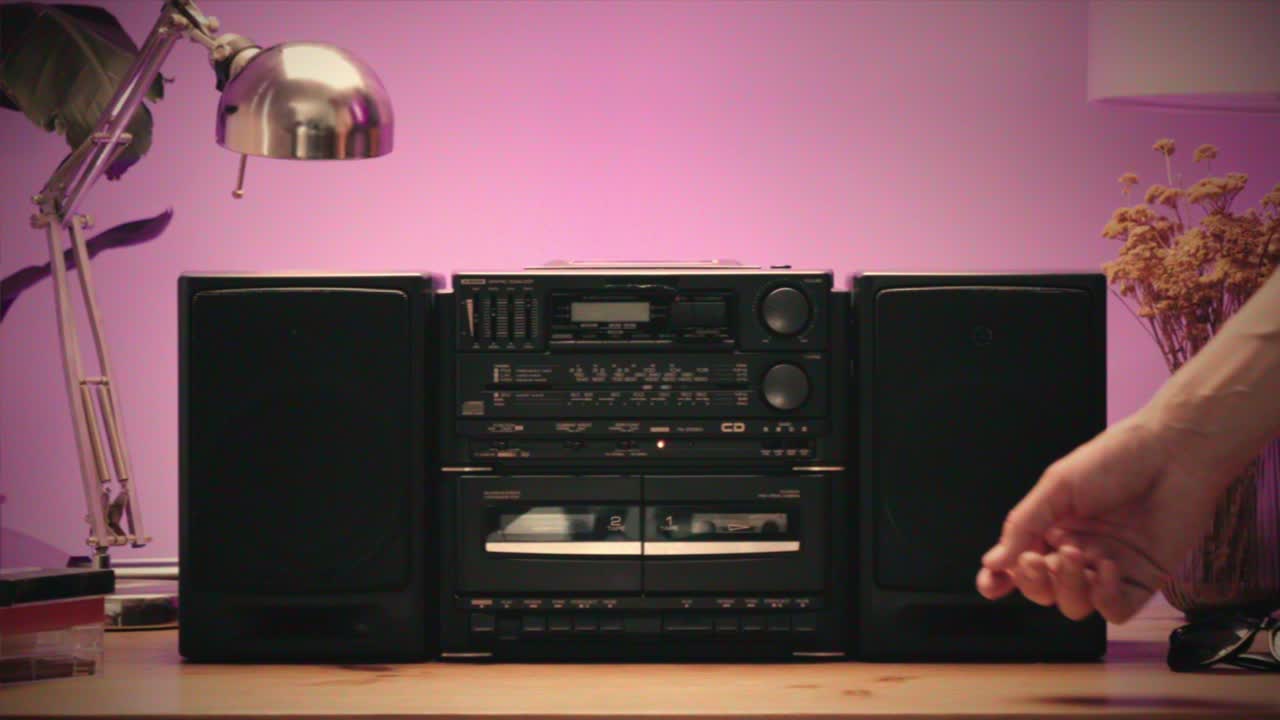 Retro radio tape recorder, audio cassette close-up. Listening to music, old radio boom box player, macro of vintage music listening. . High quality 4k footage