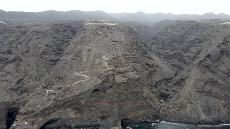 drone footage of rugged mountain rock cliffs on the volcanic island of la palma, canary islands