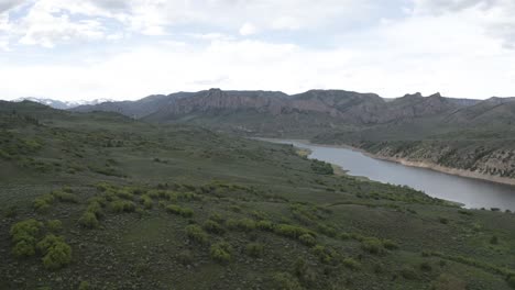 Blue-river-in-the-Rocky-Mountains-a-tributary-for-the-Colorado,-Aerial-flyover-shot