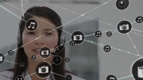 Animation-of-network-of-connections-and-icons-over-businesswoman-wearing-headset