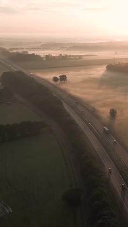 highway through misty sunrise