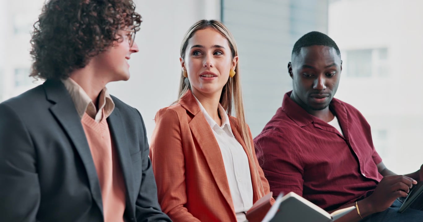 Diverse Group of Professionals Collaborating in a Modern Office Meeting