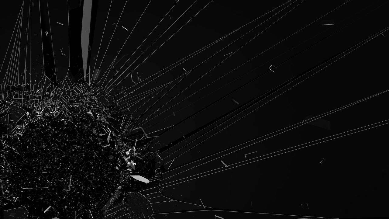 Glass cracking against a green screen background with sharp dramatic effects showcasing cracks