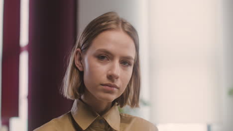 Close-Up-View-Of-Woman-Looking-At-Camera-1