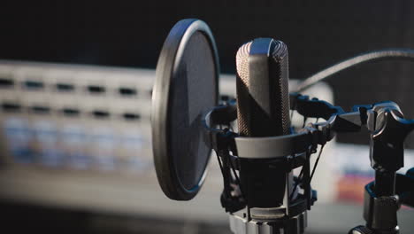 close-up of a microphone in a recording studio